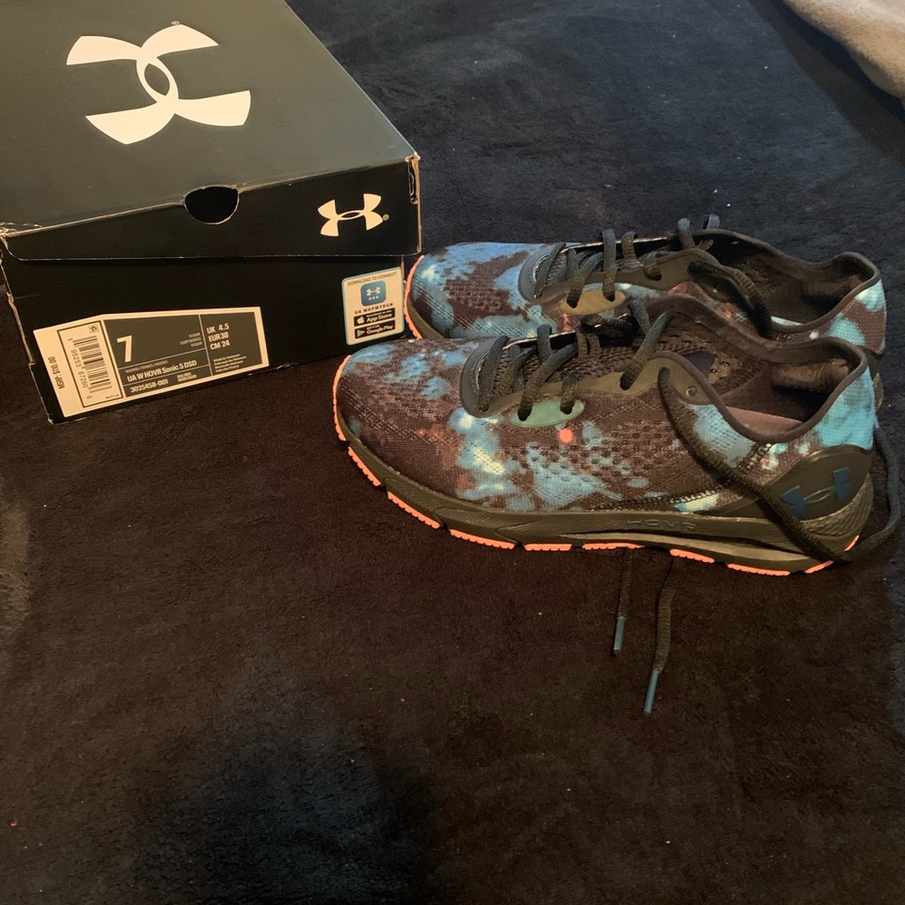 Women’s  black/ blue UA running shoe, size 7